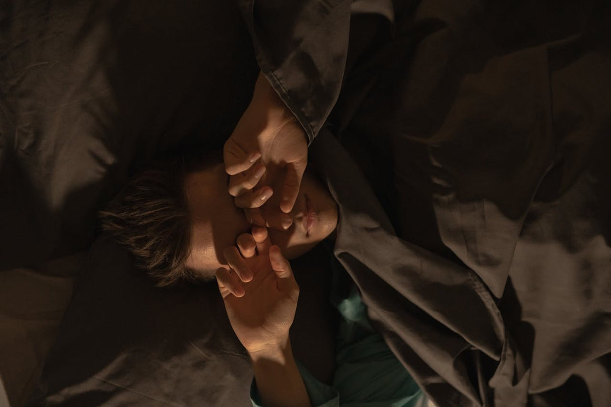 Man waking up after a full night of sleep